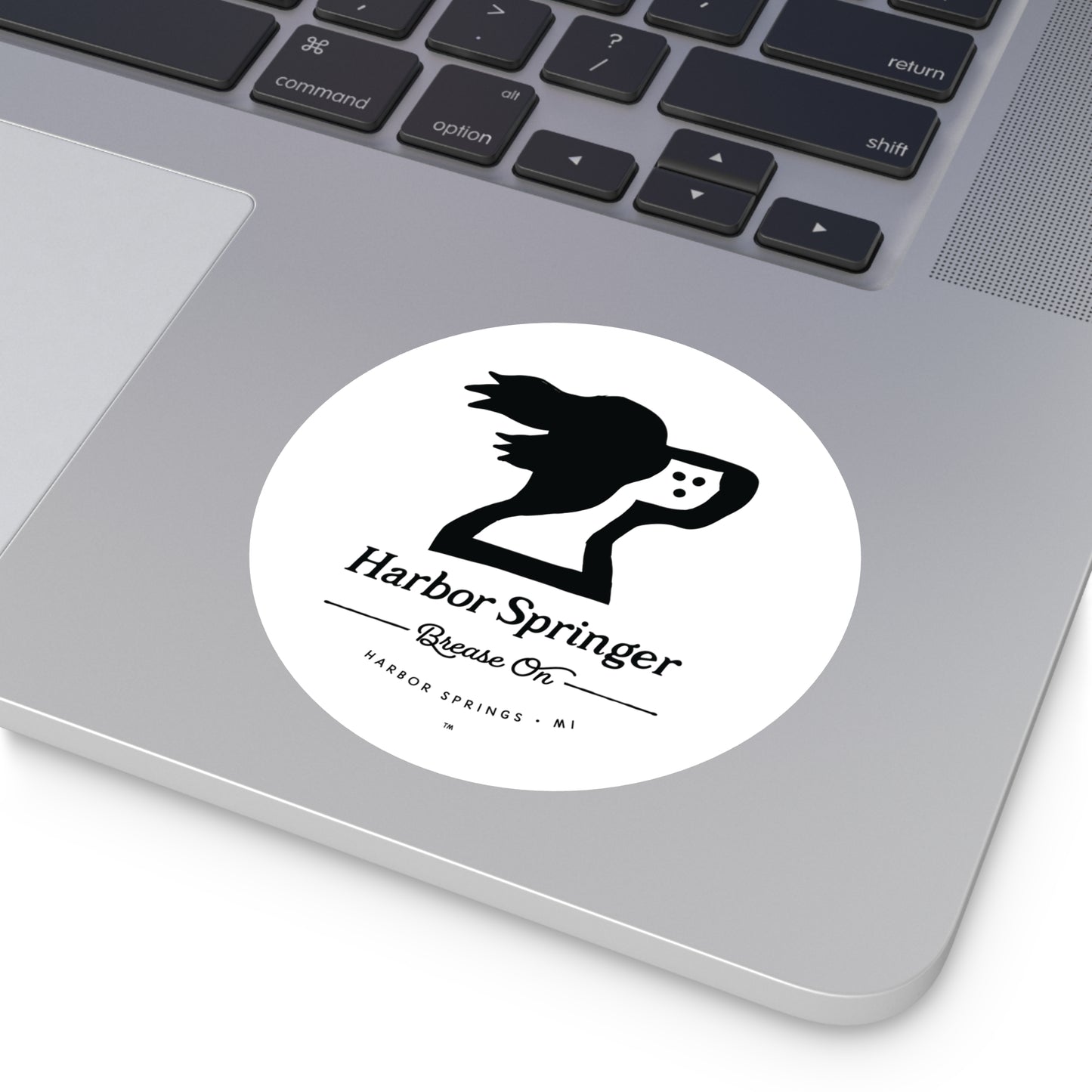 Larger round laptop sticker of Michigan brand Harbor Springer springer spaniel dog logo with Brease On tagline.