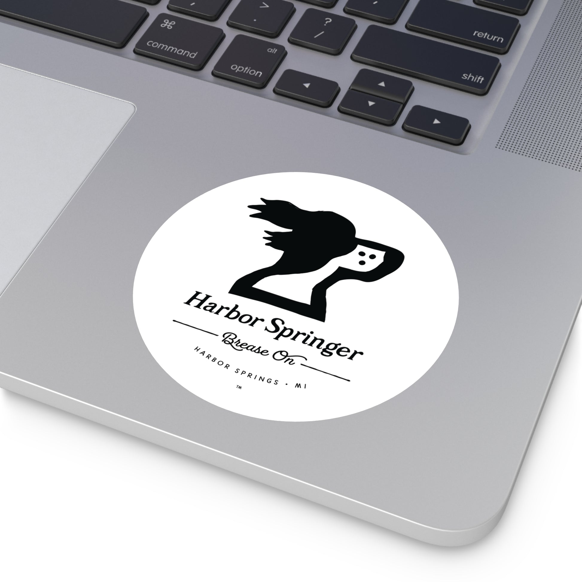 Larger round laptop sticker of Michigan brand Harbor Springer springer spaniel dog logo with Brease On tagline.
